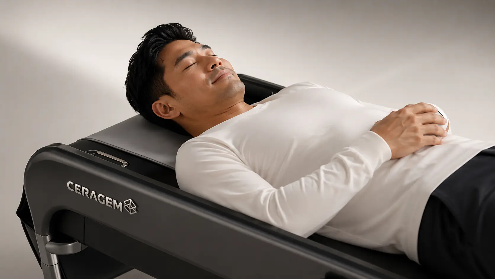 Close-up of a man resting comfortably on the CERAGEM Master V4 thermal massage bed